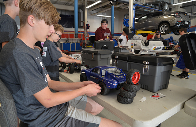 Students working on remote-controlled car