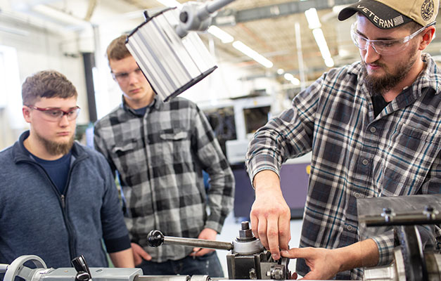 Machine Technician Students Working on a Project. 