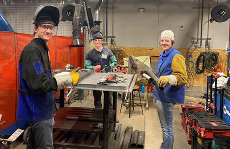 Three students wielding