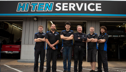 alumnus scott schulte and staff outside of his auto service shop Hi Ten Sevice