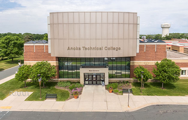 Aeriel view of the entrance of Anoka Technical College in the summertime. 