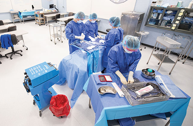 Sterile processing students in lab