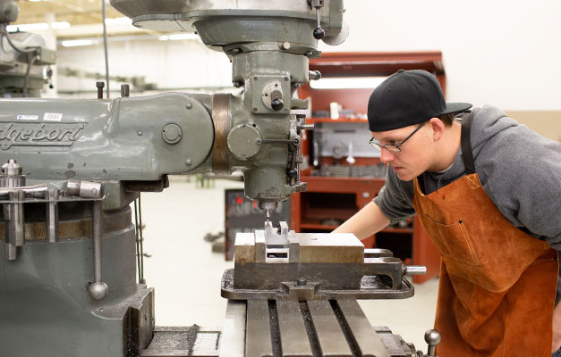 A Construction Student Using Equipment in the Lab. 